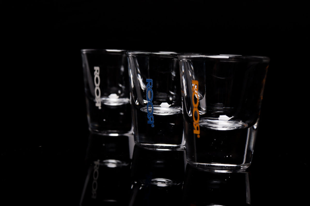 ROOR Shot Glass with thick clear base and assorted decal colors, 1oz capacity.